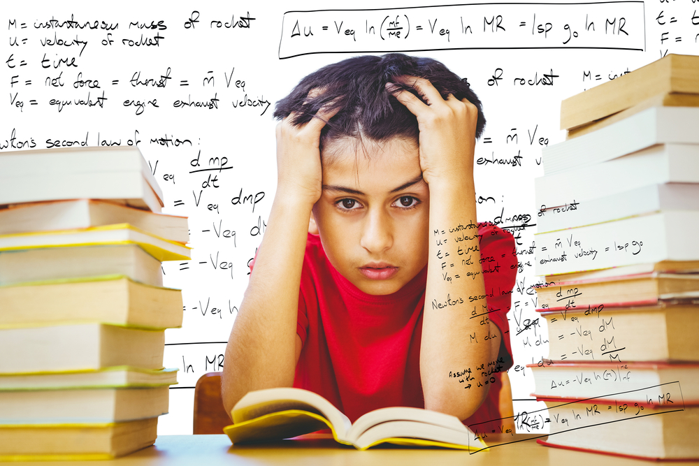 Child stressed with books surrounding them. Child pulling at hair with math problems written on clear glass.