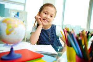 gifted girl with pencil taking the Stanford Binet 5